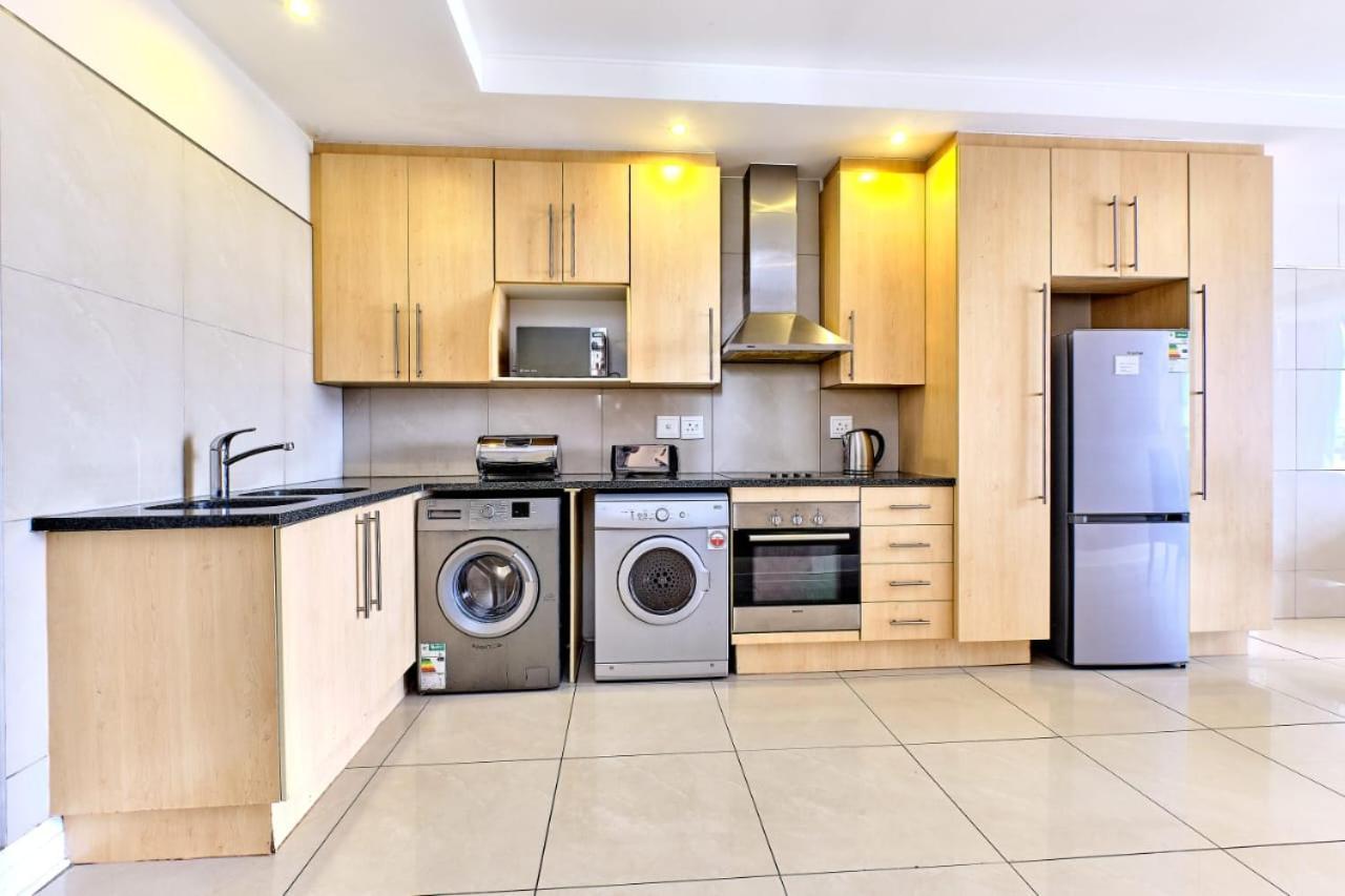 Sandton Serviced Apartments@Hydro Йоханнесбург Номер фото