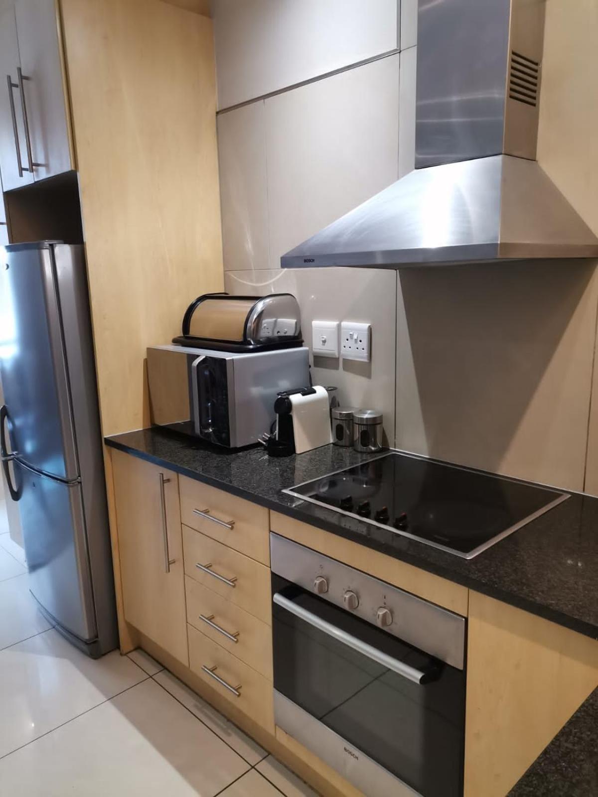 Sandton Serviced Apartments@Hydro Йоханнесбург Номер фото